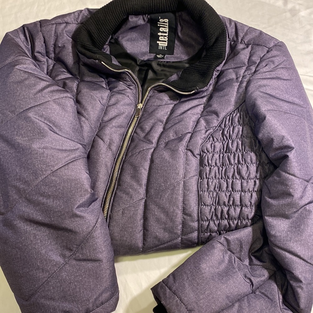 Woman’s winter coat size 1X.